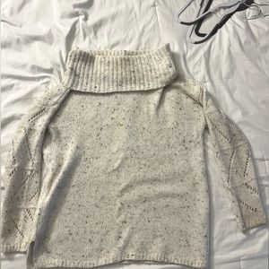 White speckled turtle neck sweater